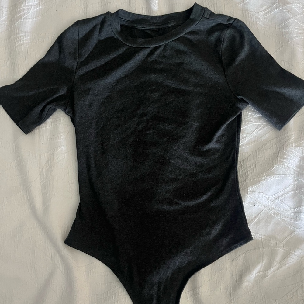 small dark grey form fitting bodysuit